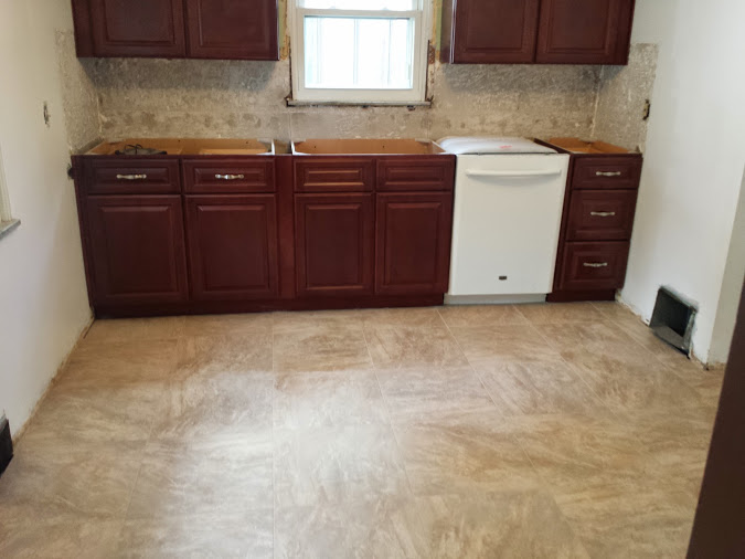 kitchen floor porcelain tile install prior to counters